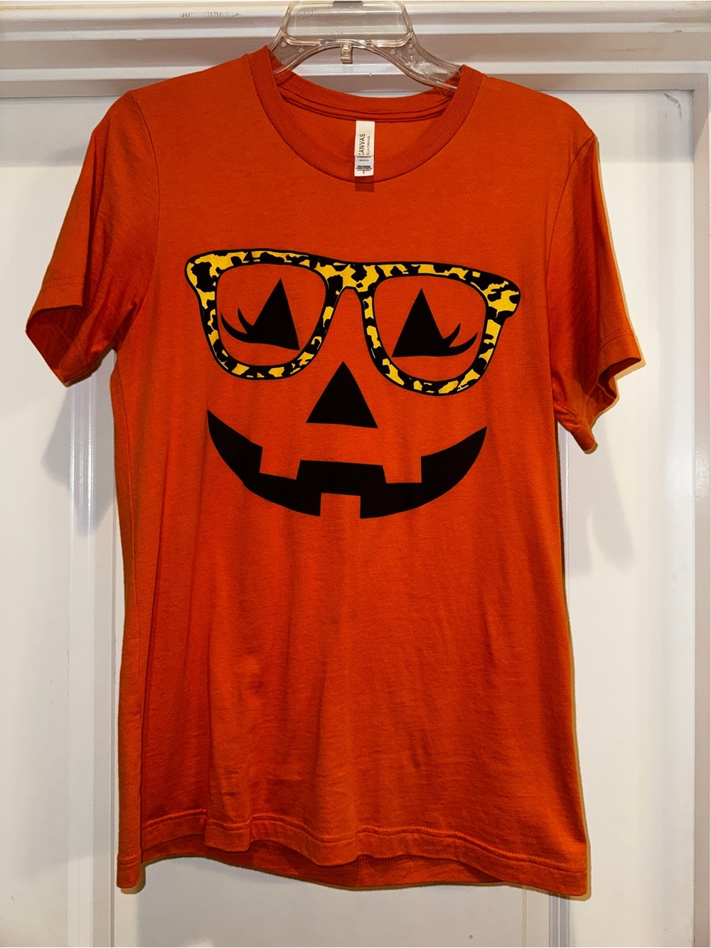 Bella Cavas Women’s Pumpkin Face with Glasses Graphic Tee - Orange